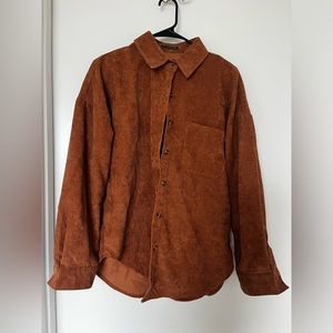 Burnt orange ribbed button up flannel-like shirt